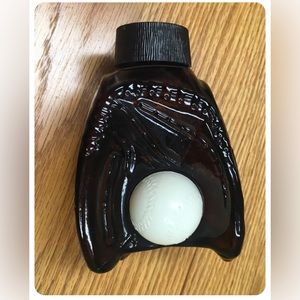Avon Fielder's Choice Wild Country Aftershave Baseball Mitt bottle is 1/4 full
